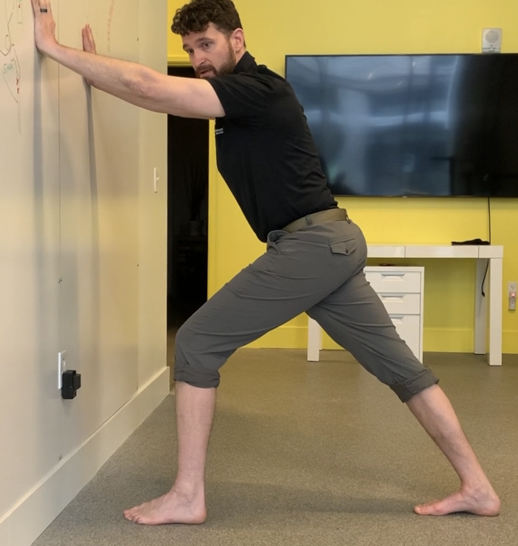 Dr. Seth Hosmer, DC demonstrating the Active Calf Stretch